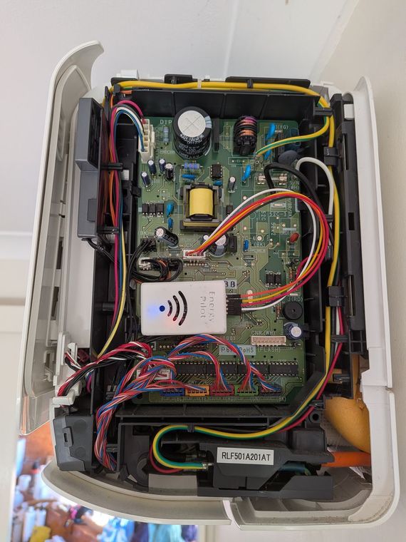 Close-up of the branded EnergyPilot control module fitted to the air conditioner's control board