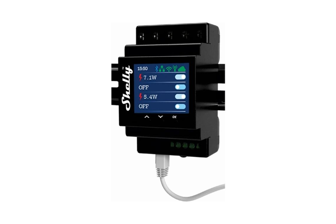 Photo of the Shelly Pro 4PM, a black switchboard module with a colour screen showing the power on each of its four channels, with a network cable plugged in